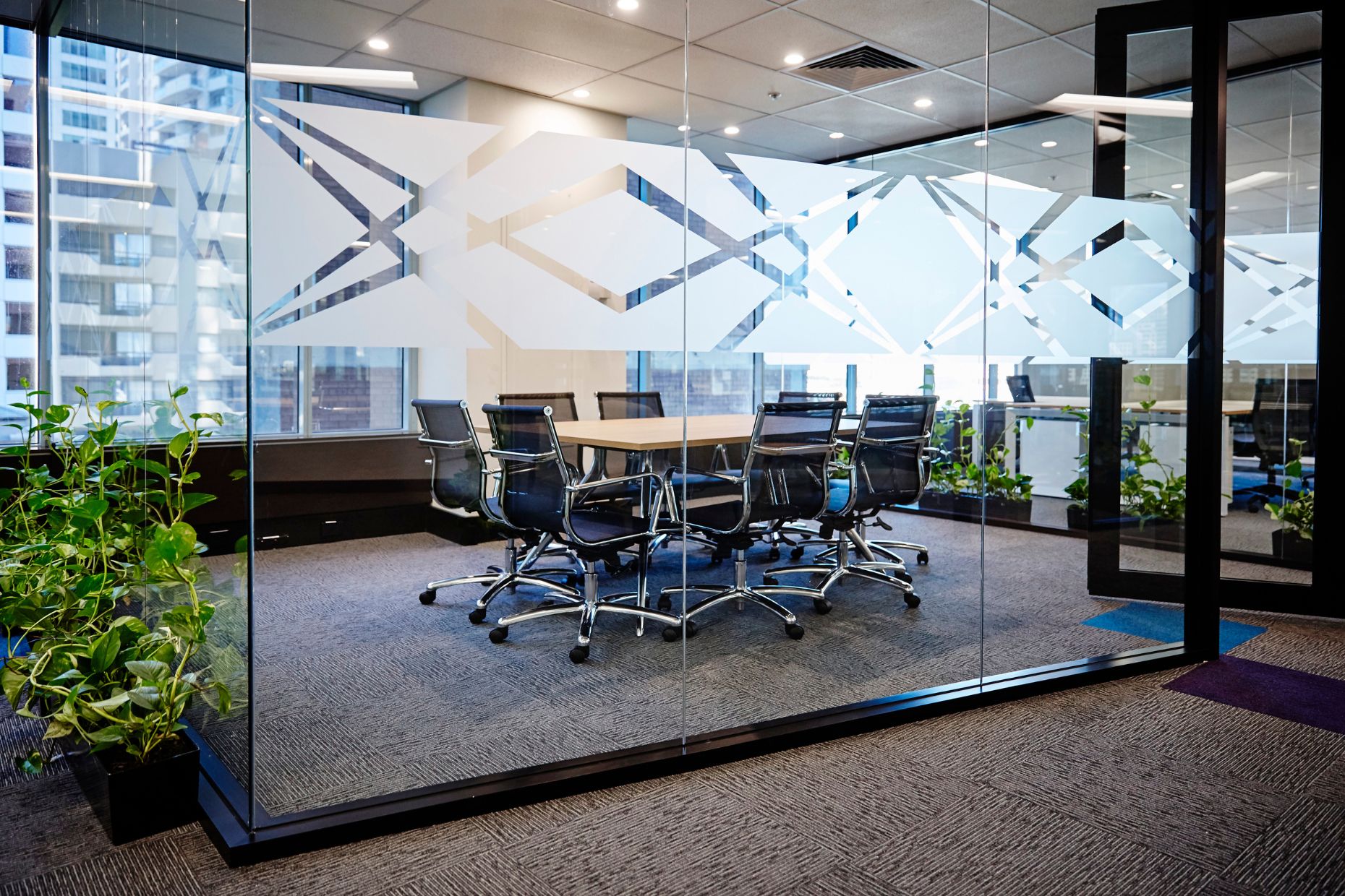 Interior glass walls with decorative glass